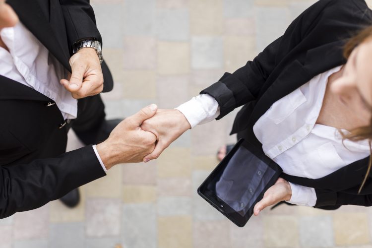 business-people-shaking-their-hands